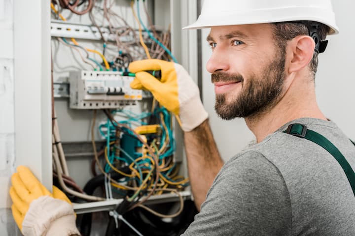 Smiling electrician